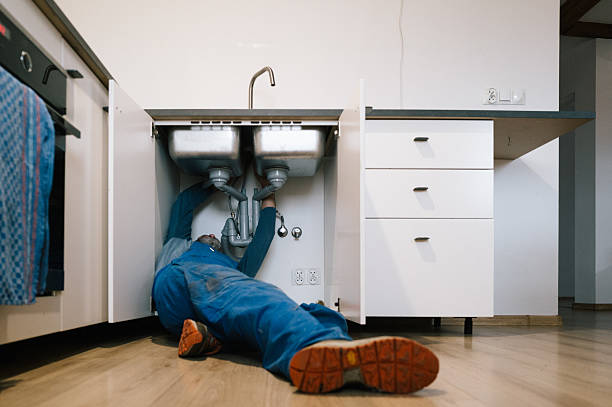 Professional Plumbing technician working in Uncasville, CT